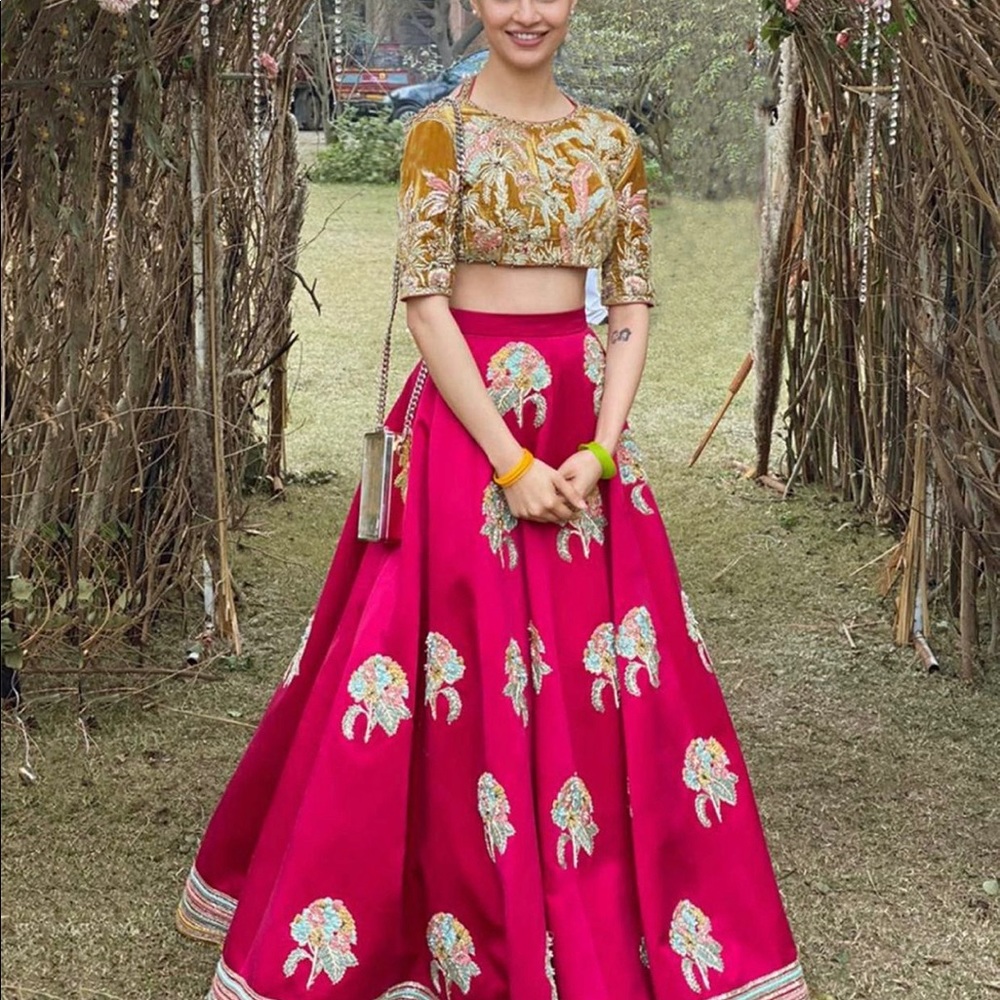 Embroidered Gold Crop Top and Fuchsia Bridal Lehenga